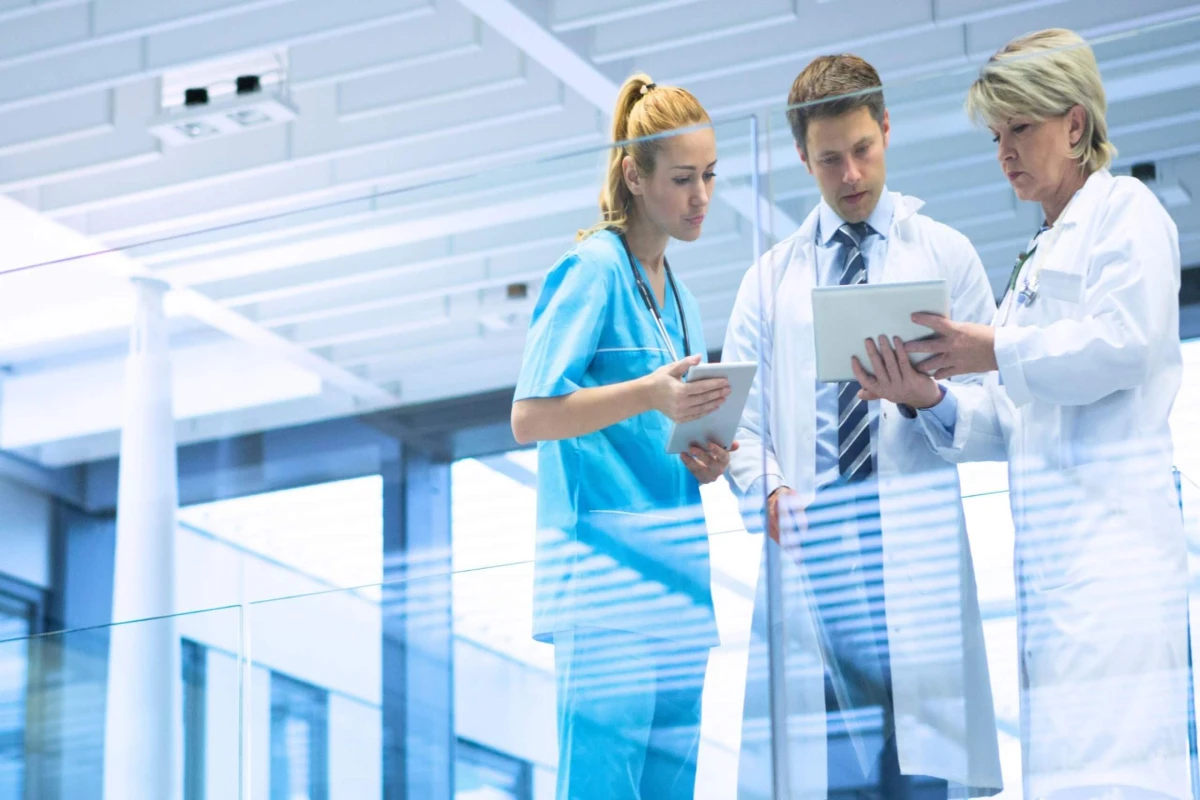 Healthcare professionals utilizing cloud-based tools for workflow